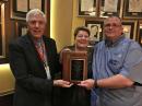 2017 HamCation Chairman Peter Meijers, AI4KM (L); HamCation Committee Member for Advance Registration Lidy Meijers, KJ4LMM, and Orlando Amateur Radio Club President John Knott, N4JTK, hold the “Spirit of Amateur Radio” award, given to HamCation and the Orlando Amateur Radio Club by the Dayton Amateur Radio Association and Hamvention. [Bob Inderbitzen, NQ1R, photo]